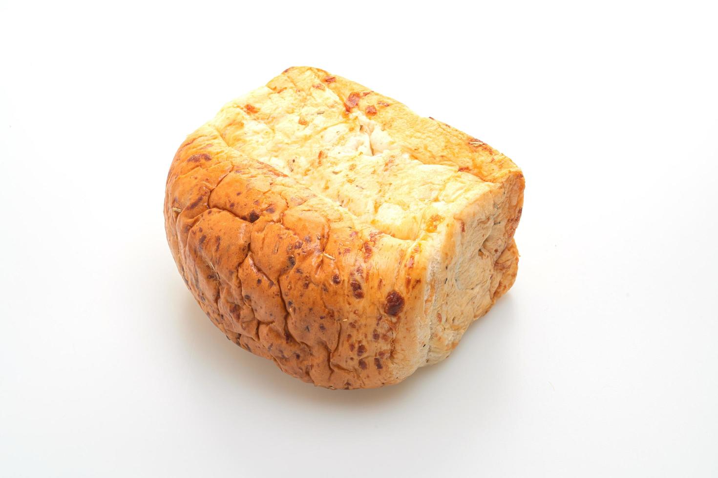Loaf of bread on white background photo