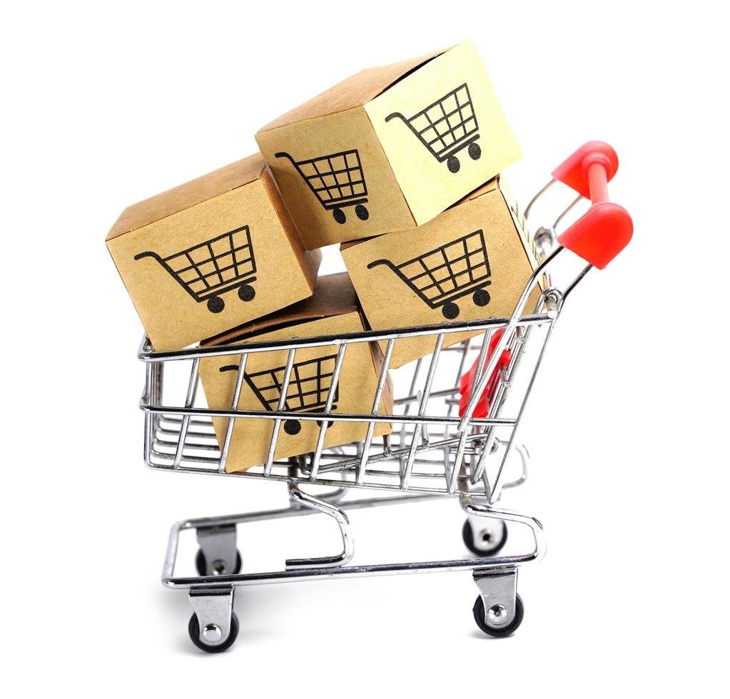 caja del carro de compras, comercio de importación y exportación en línea foto