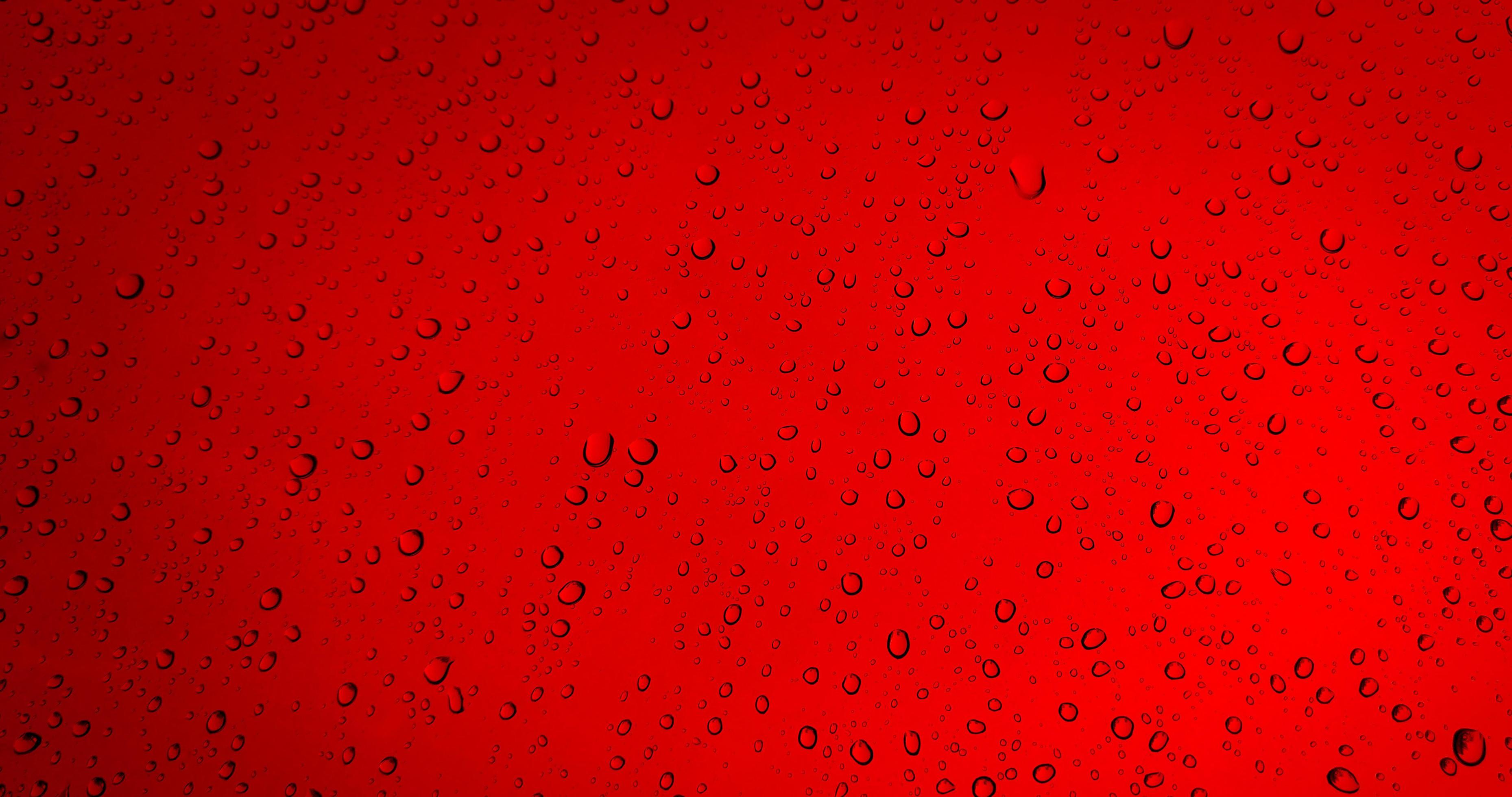 Rain drops on red glass window background 3389275 Stock Photo at Vecteezy