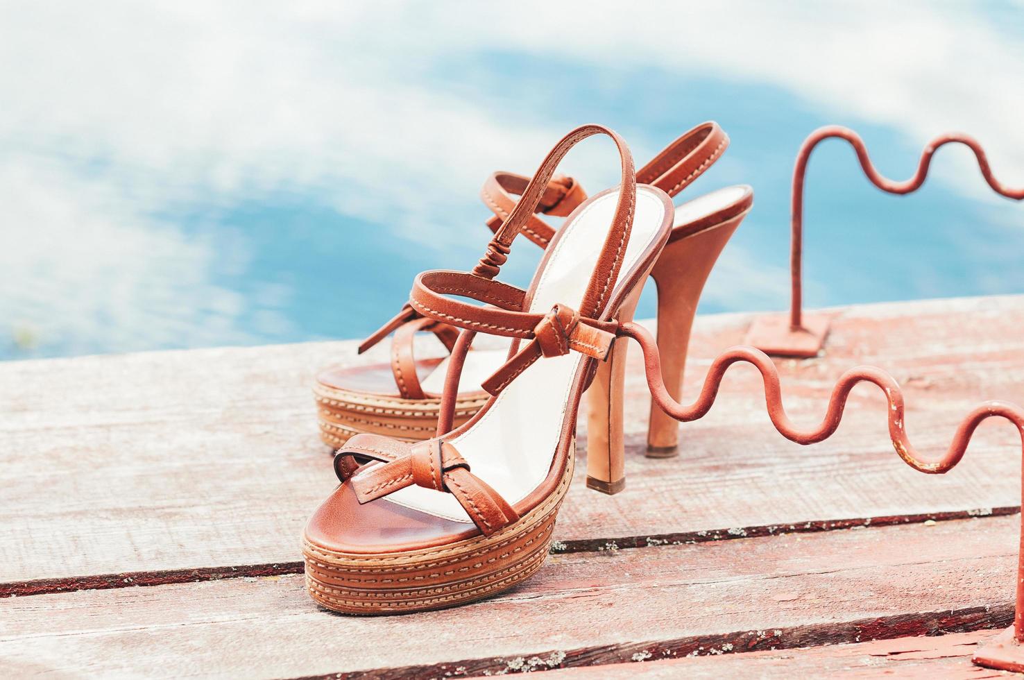 vintage high heel summer shoes by the river photo