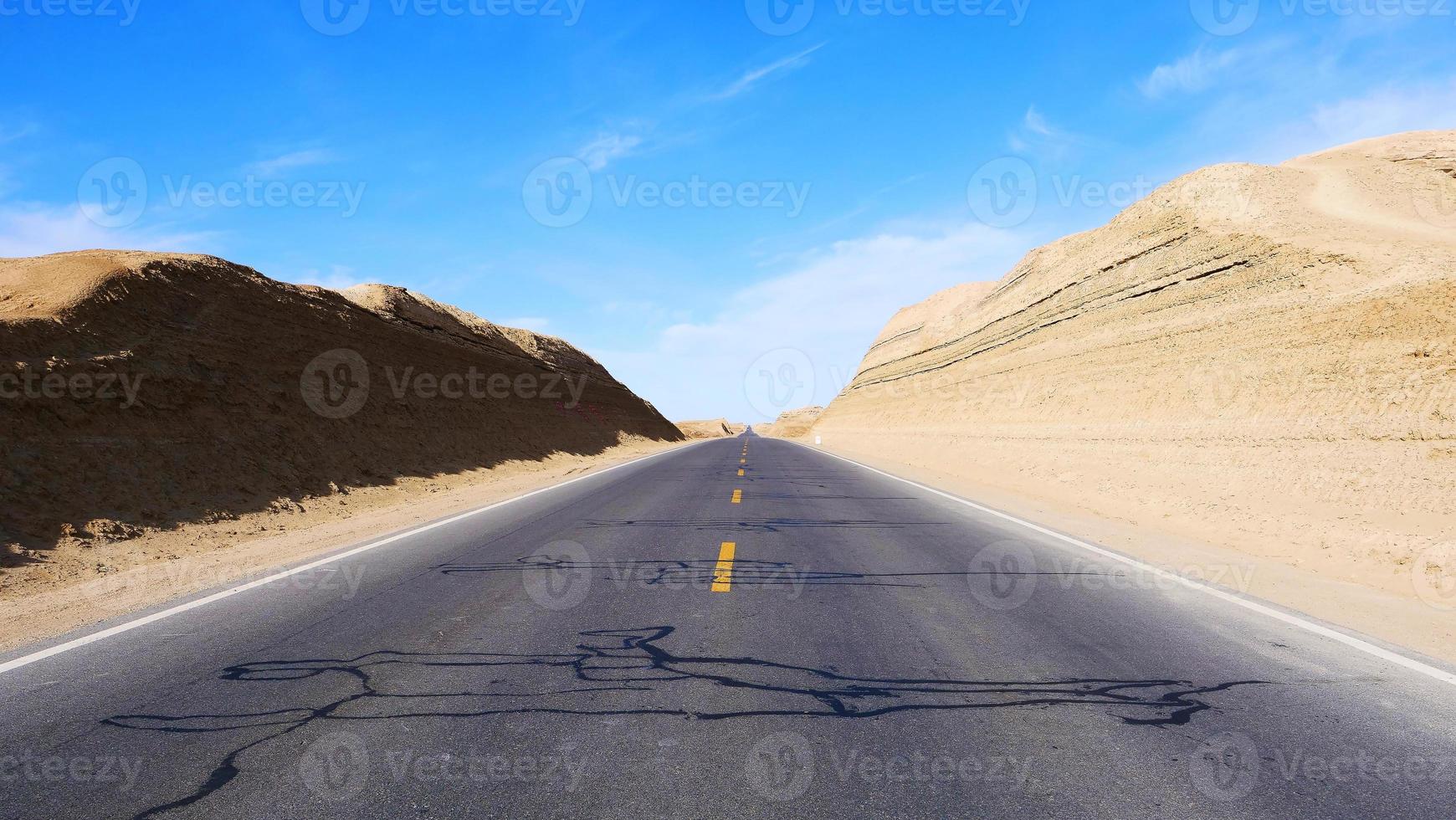 Landscape view of sunny blue sky and high way road in Qinghai China photo