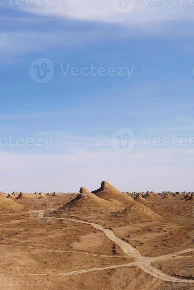 Yardang landform and sunny blue sky in Dunhuang Gansu China photo