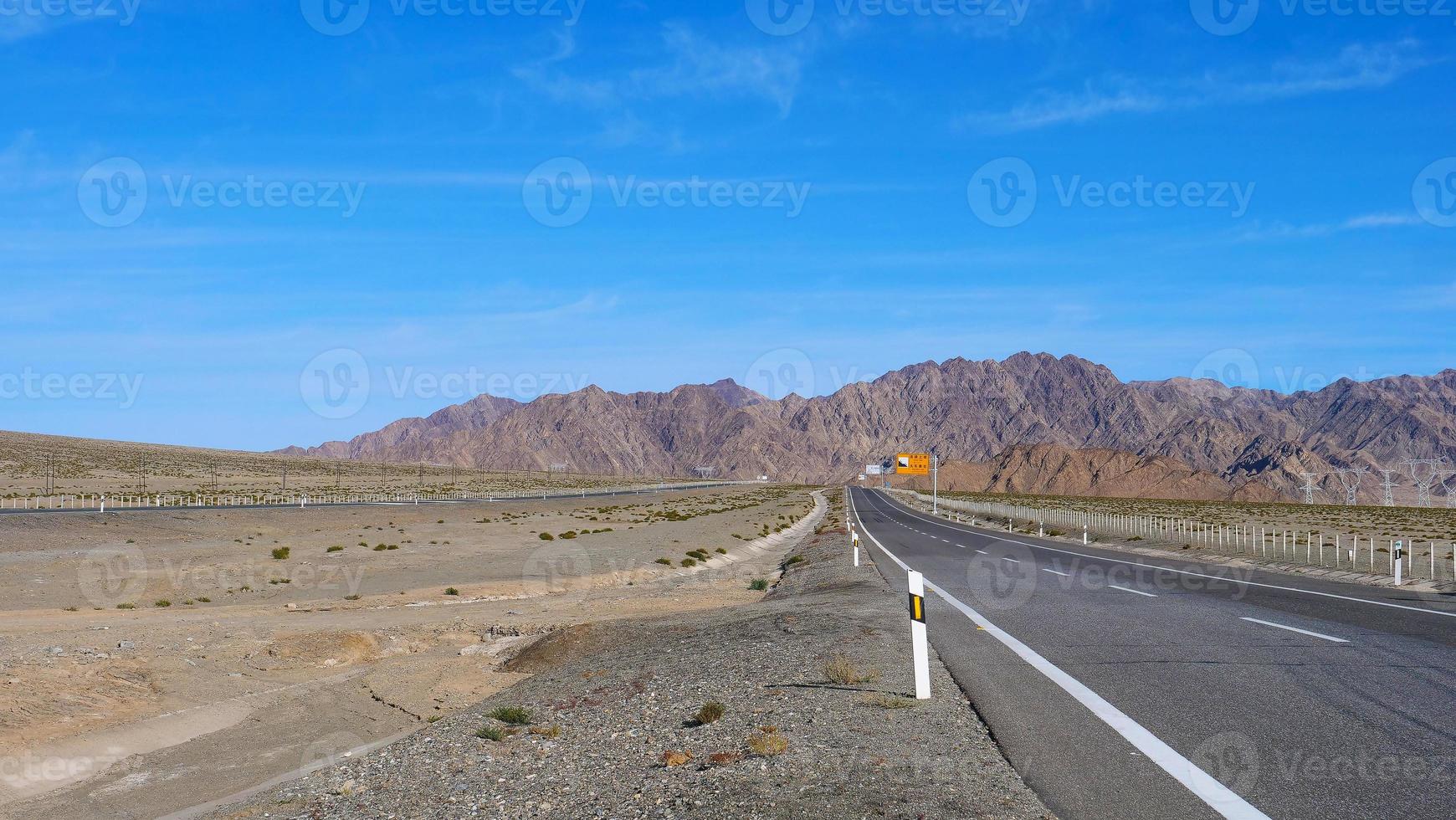 Landscape view of beautiful blue sky and high way road in Gansu Cina photo