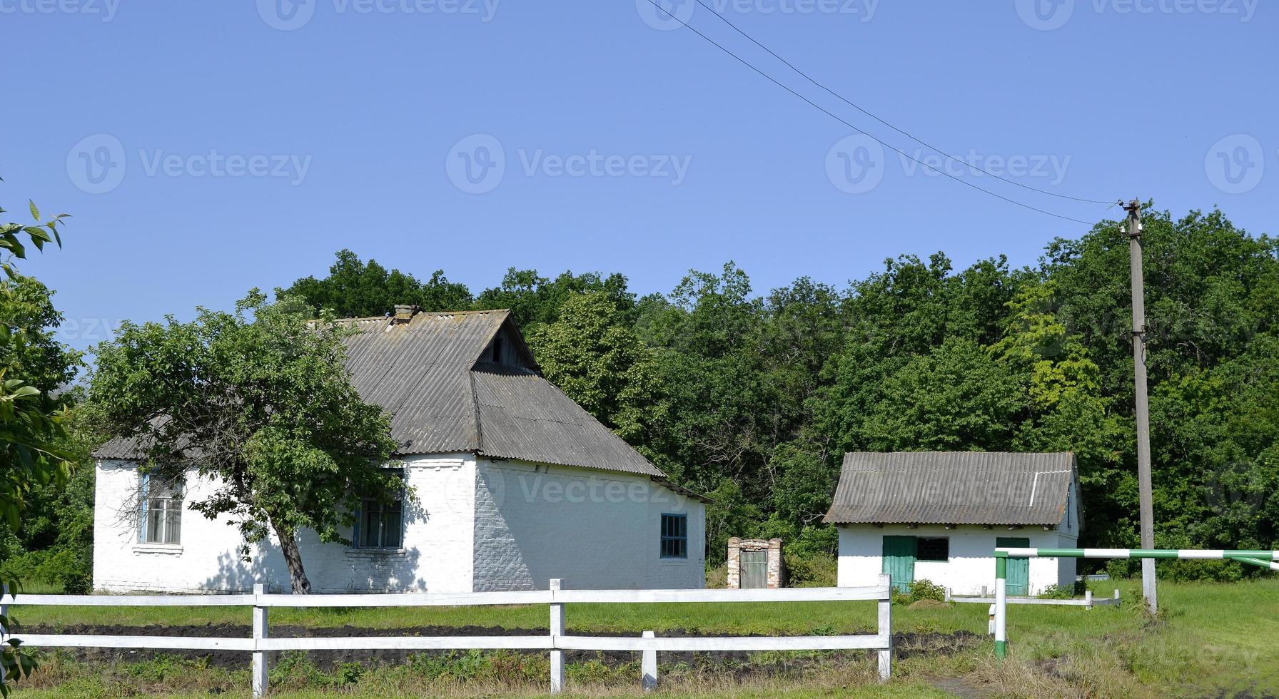 Beautiful old abandoned building farm house in countryside photo