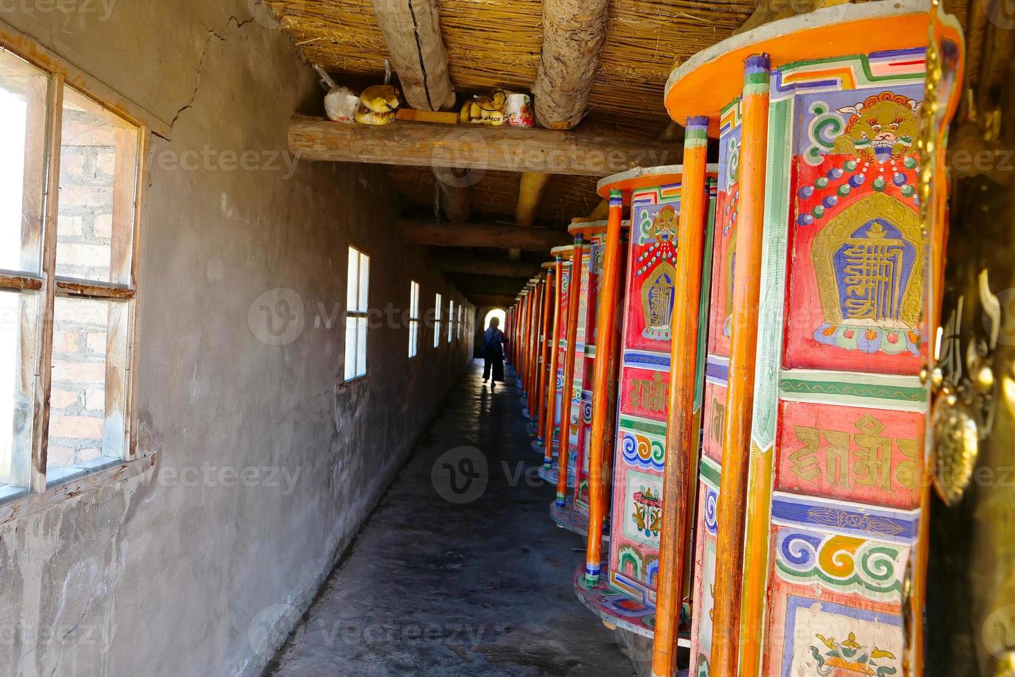 Prayer wheel in Arou Da Temple in Qinghai China. photo