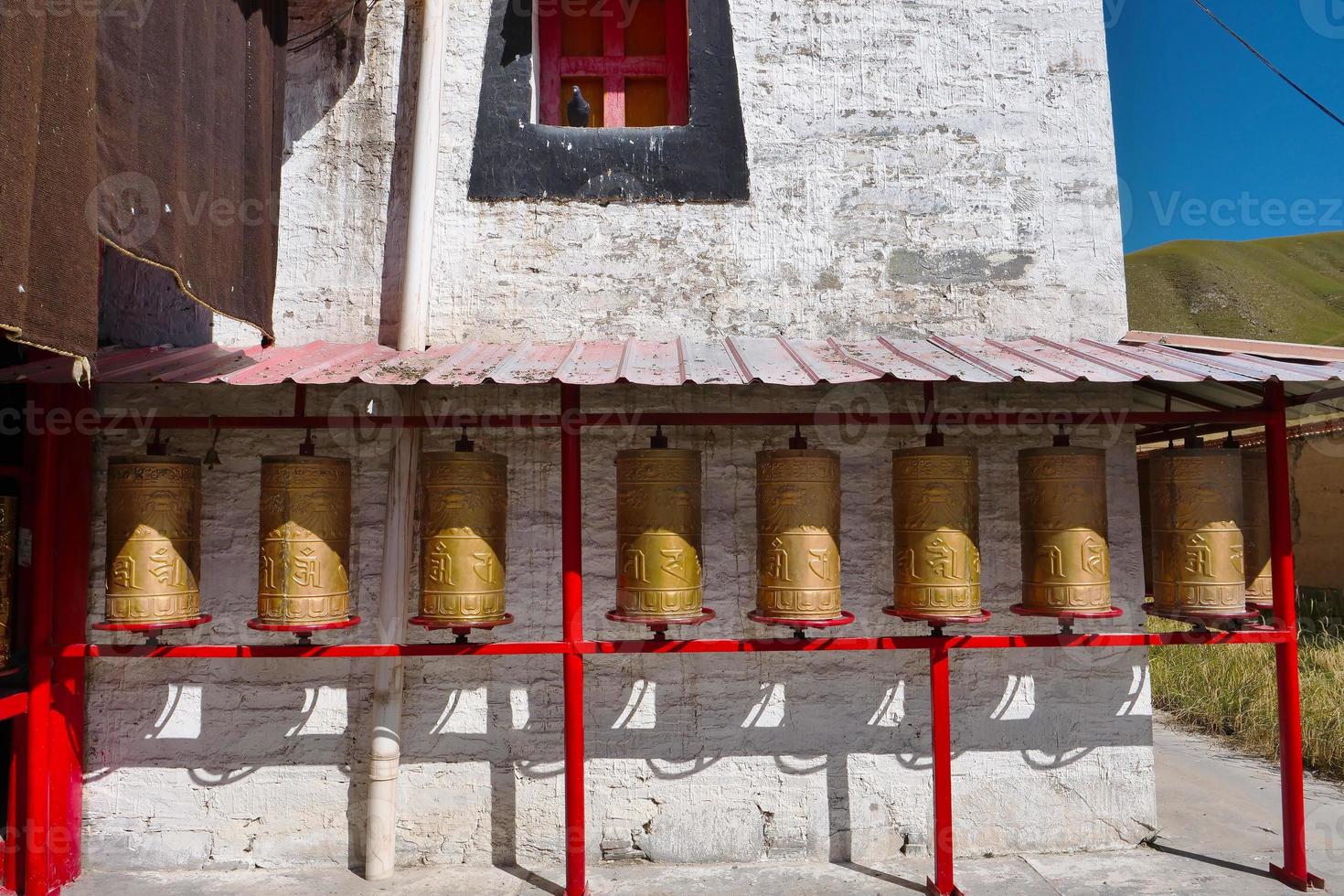 Prayer wheel in Arou Da Temple in Qinghai China. photo