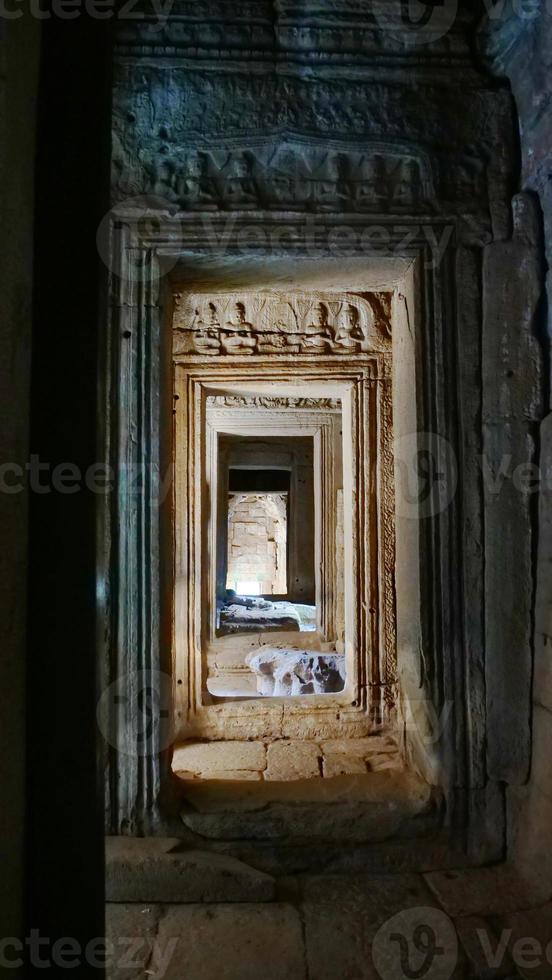 Stone door interior in Bayon Temple, Siem Reap Cambodia photo