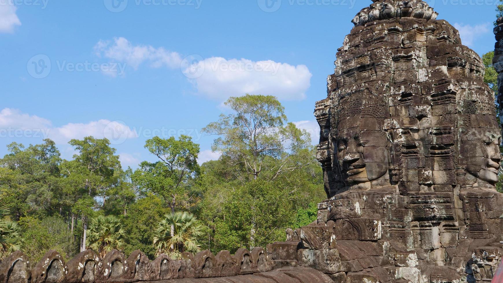 Face tower at the Bayon Temple, Siem Reap Cambodia photo