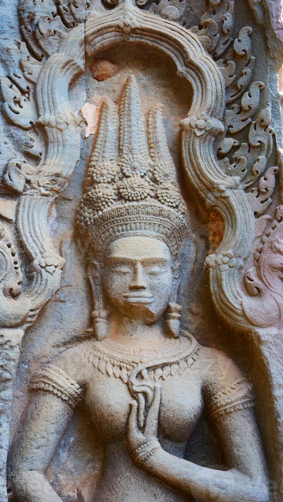 Stone carving at Ta Prohm Temple, Siem Reap Cambodia. photo