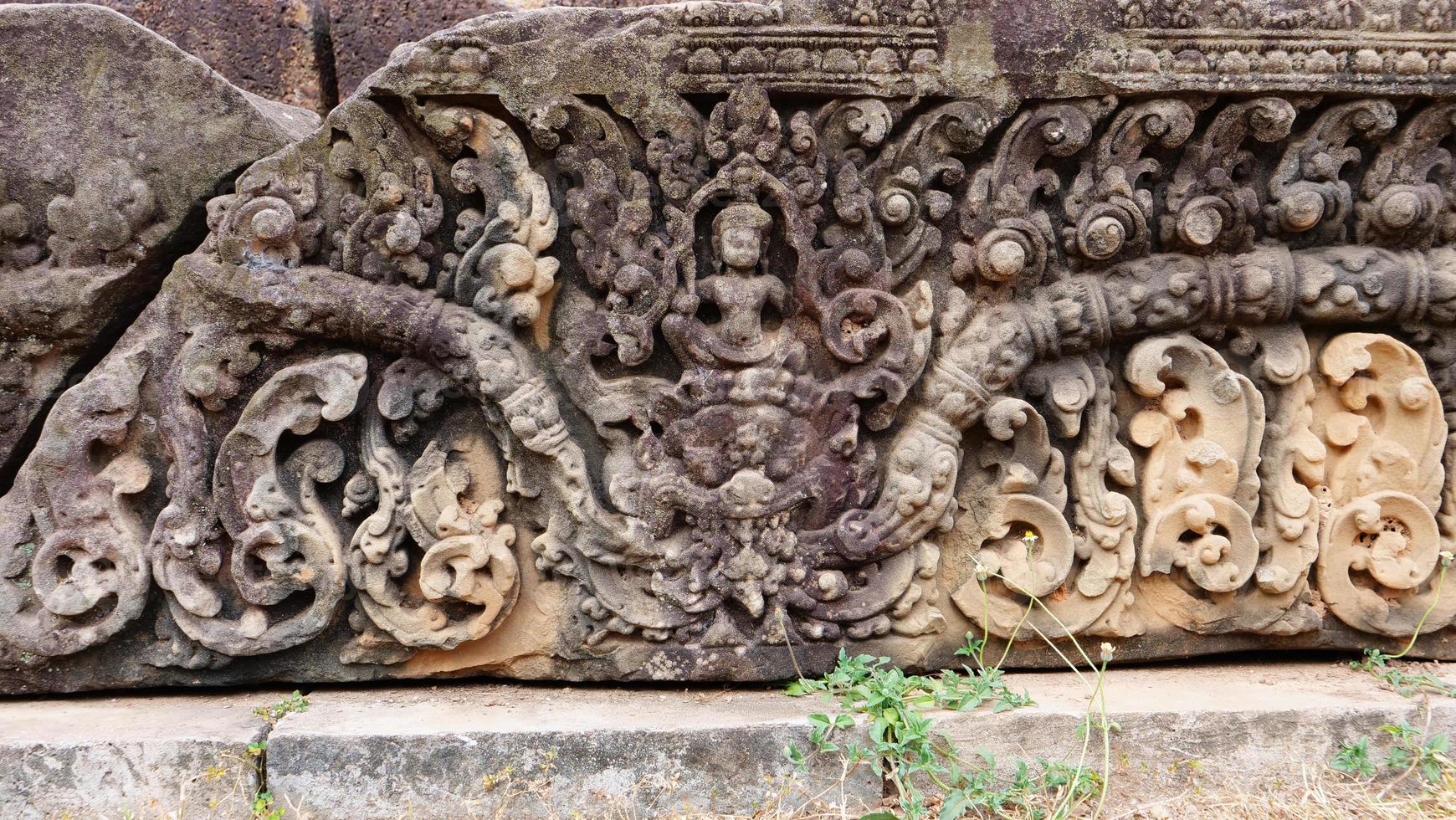 Stone carving art at buddhist khmer ruin of Pre Rup Siem Reap photo