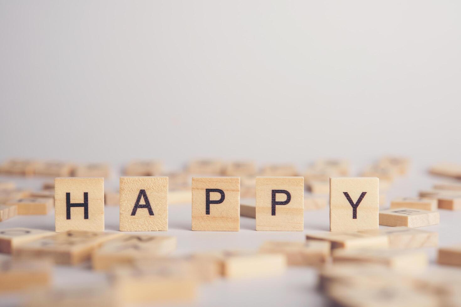HAPPY wooden tile font  concept photo