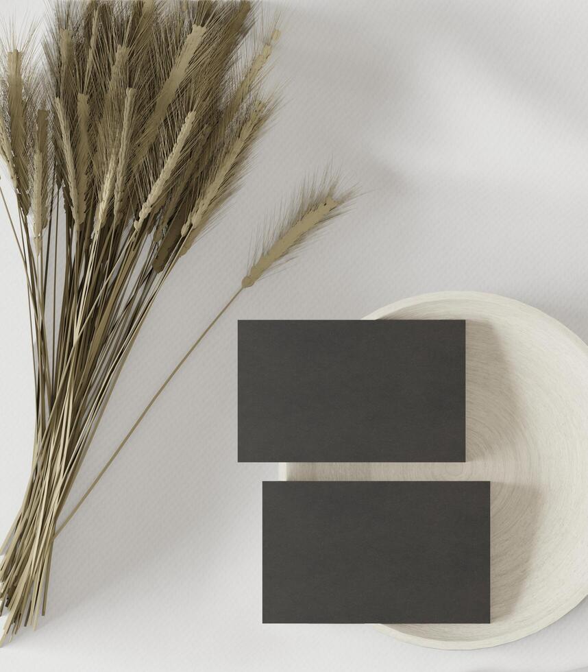 Black paper is placed on a plate with dry grass. photo