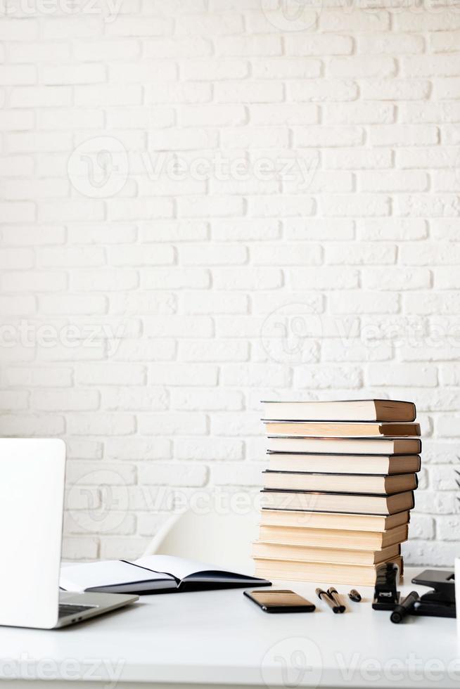 Stack of books on the table photo