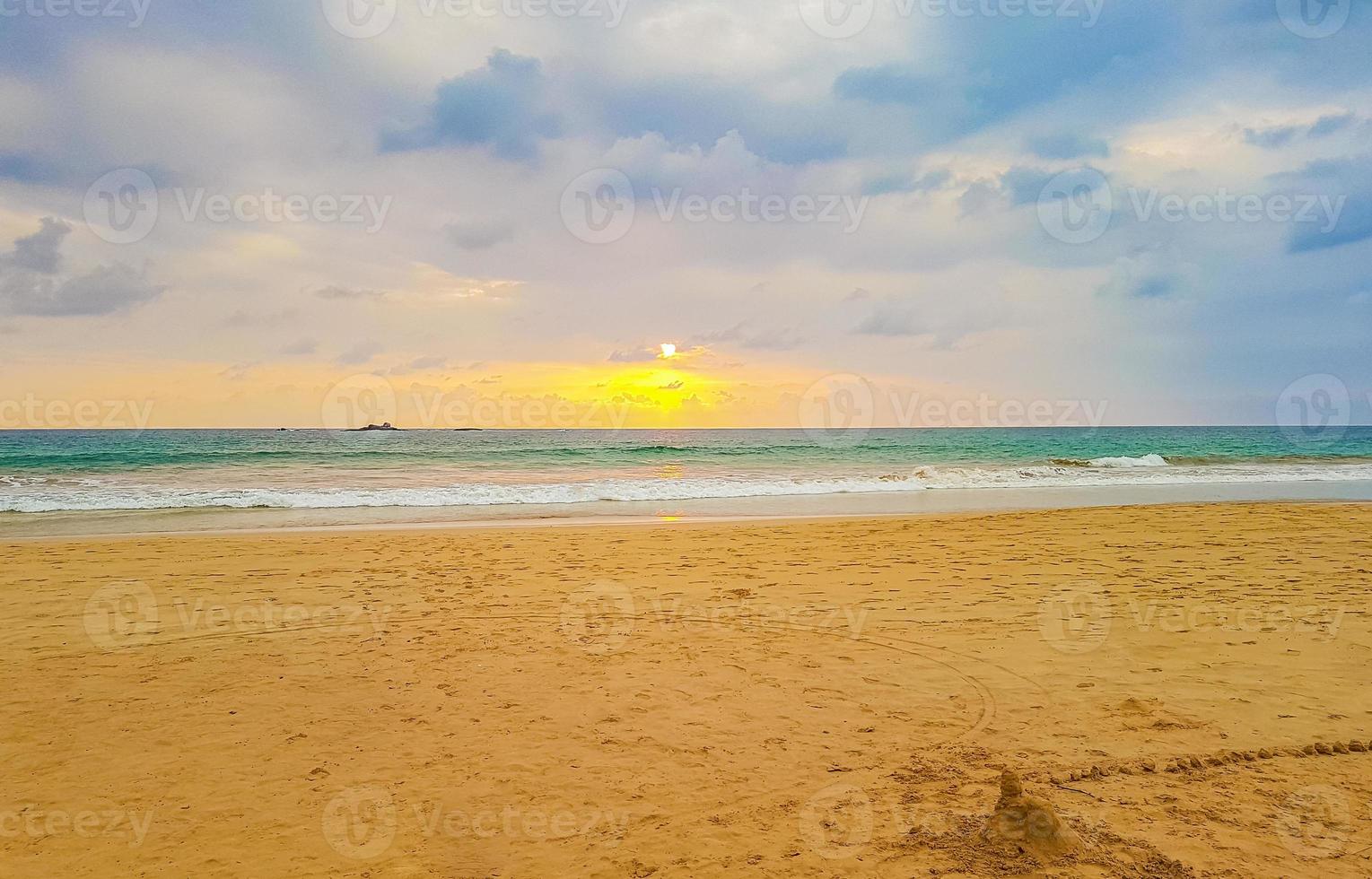 Beautiful colorful sunset landscape panorama Bentota Beach Sri Lanka. photo