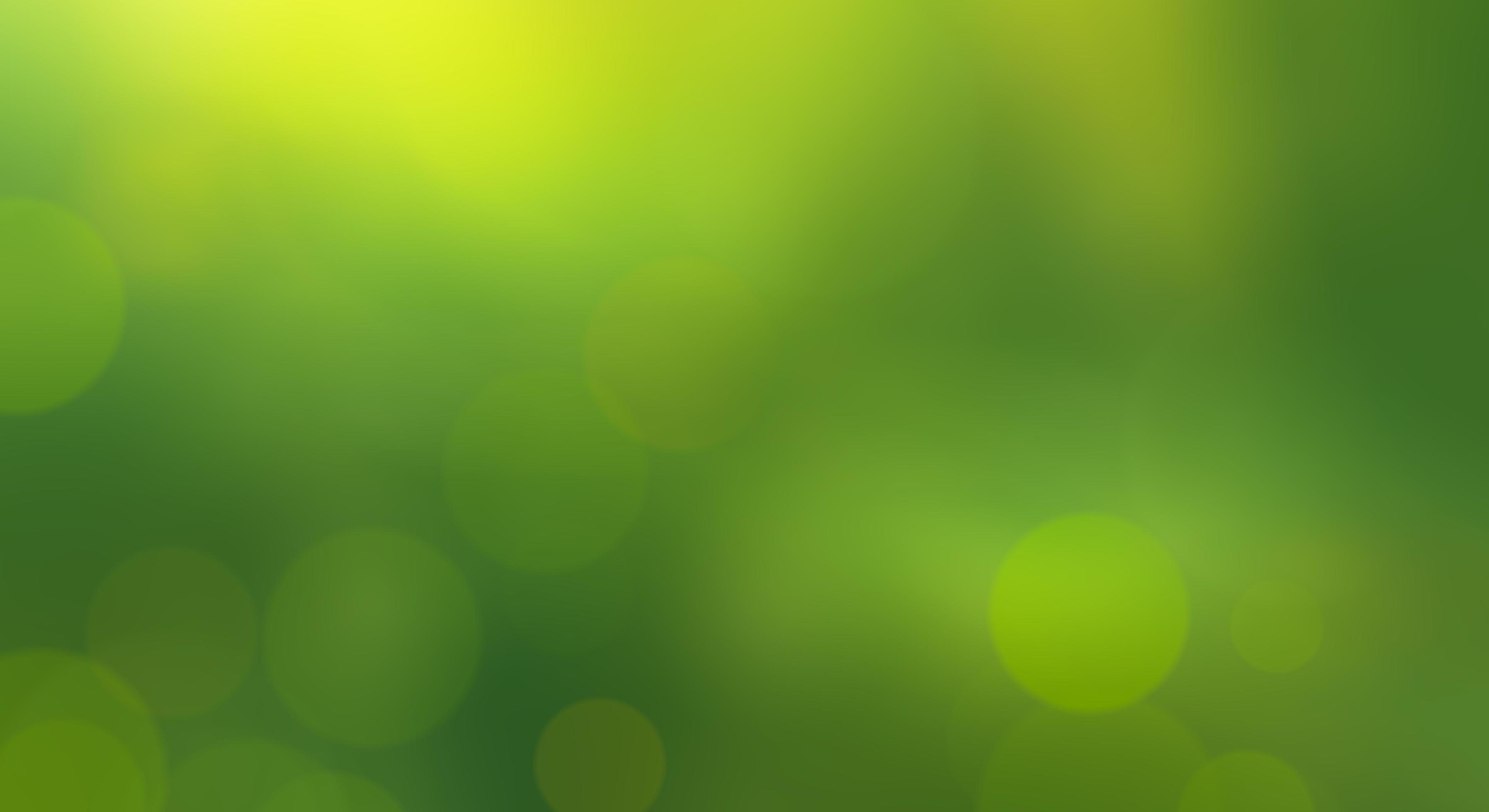 Green color blur background with bokeh. 3395417 Stock Photo at Vecteezy