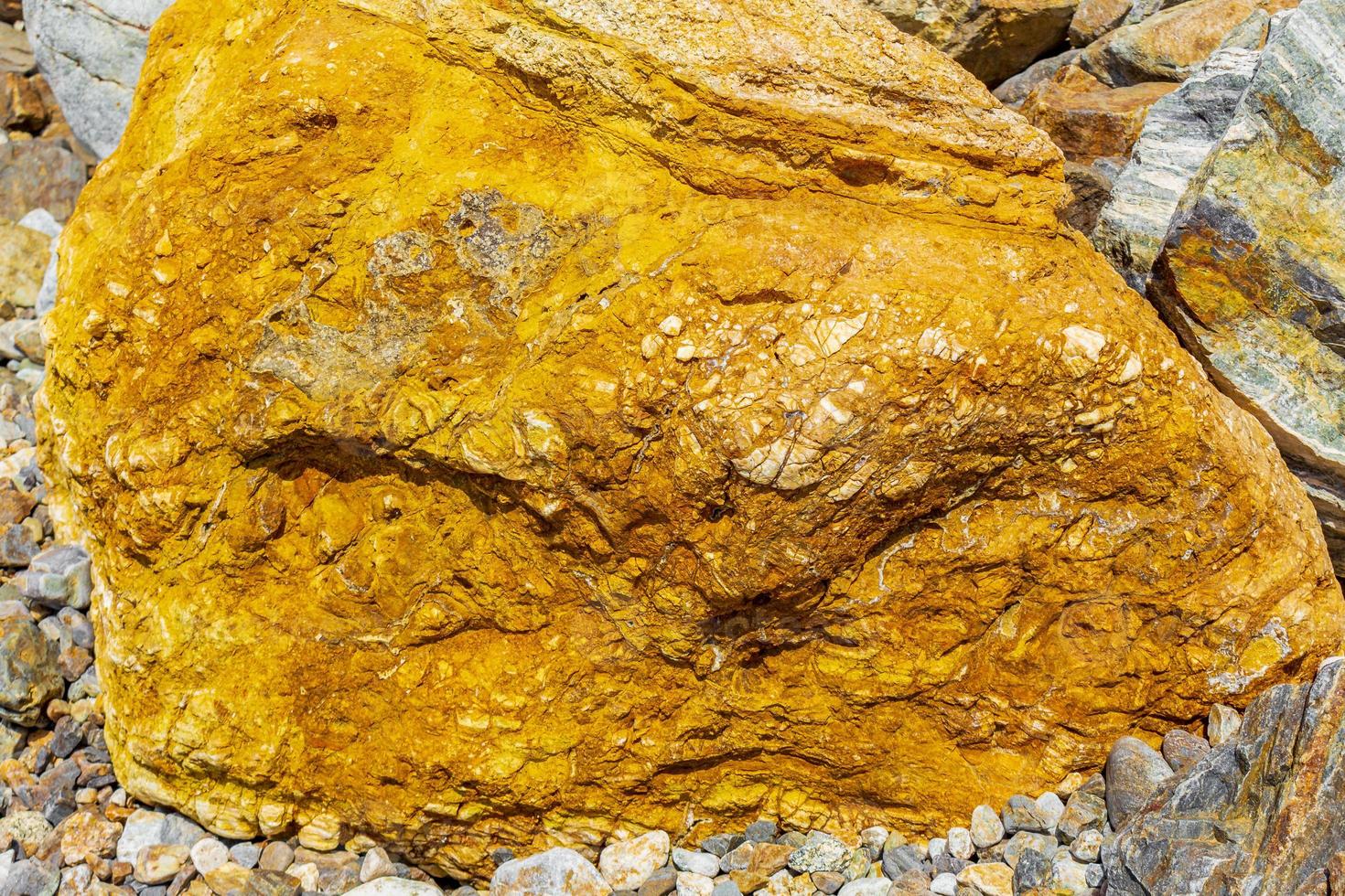 Golden yellow colored boulders and rocks on Kos Island Greece. photo