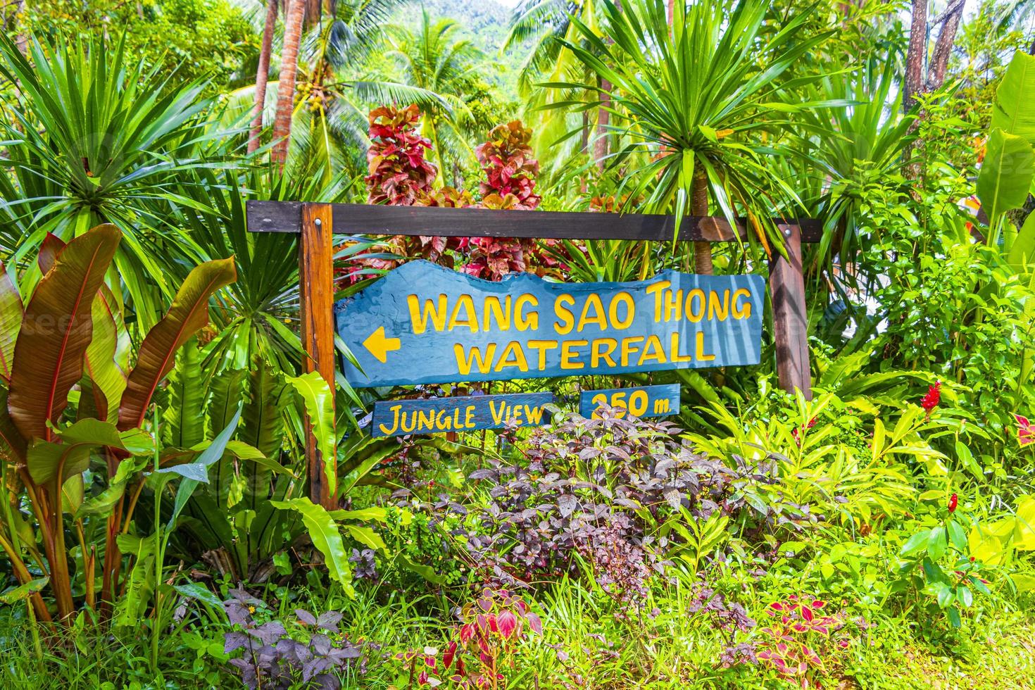 Direction sign to Wang Sao Thong Waterfall Koh Samui Thailand. photo