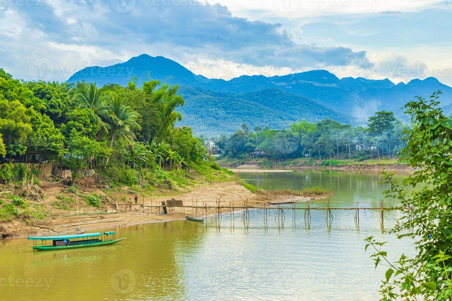 Construction of Bamboo Bridge over Mekong River Luang Prabang Laos. photo