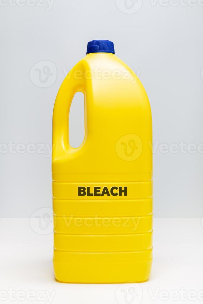 Bleach bottle. Yellow Plastic container photo