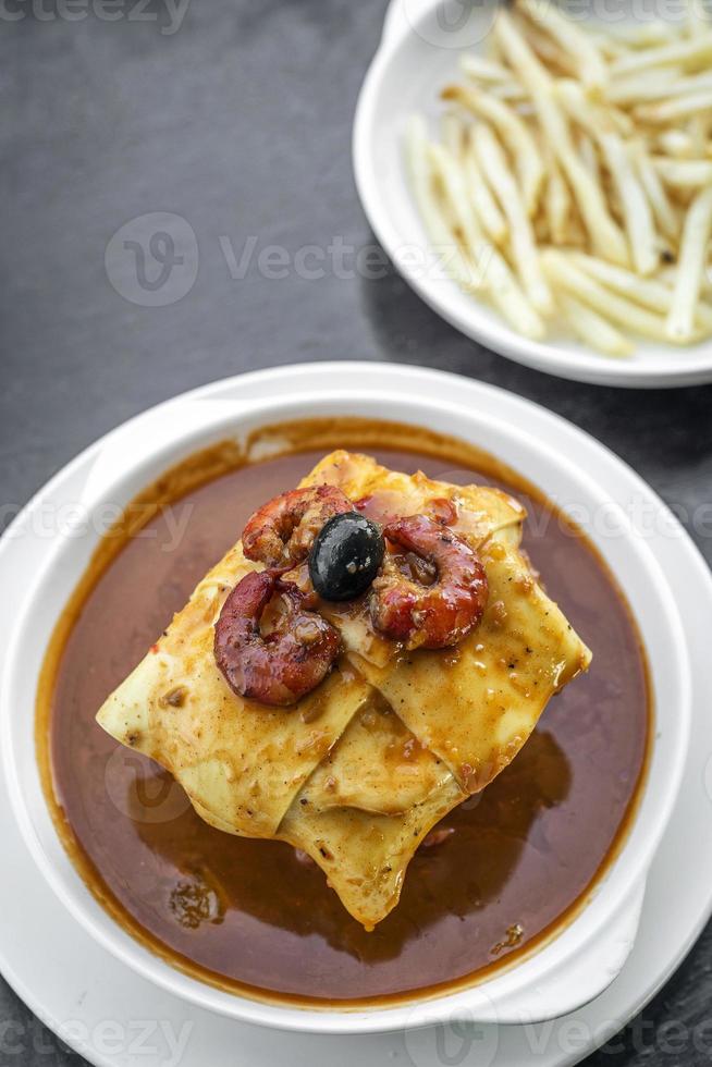 francesinha traditional meat and cheese sandwich in porto portugal photo