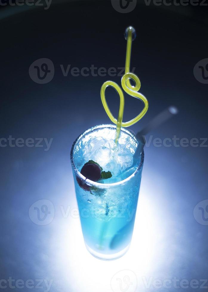 blue curacao cocktail drink with cherry photo