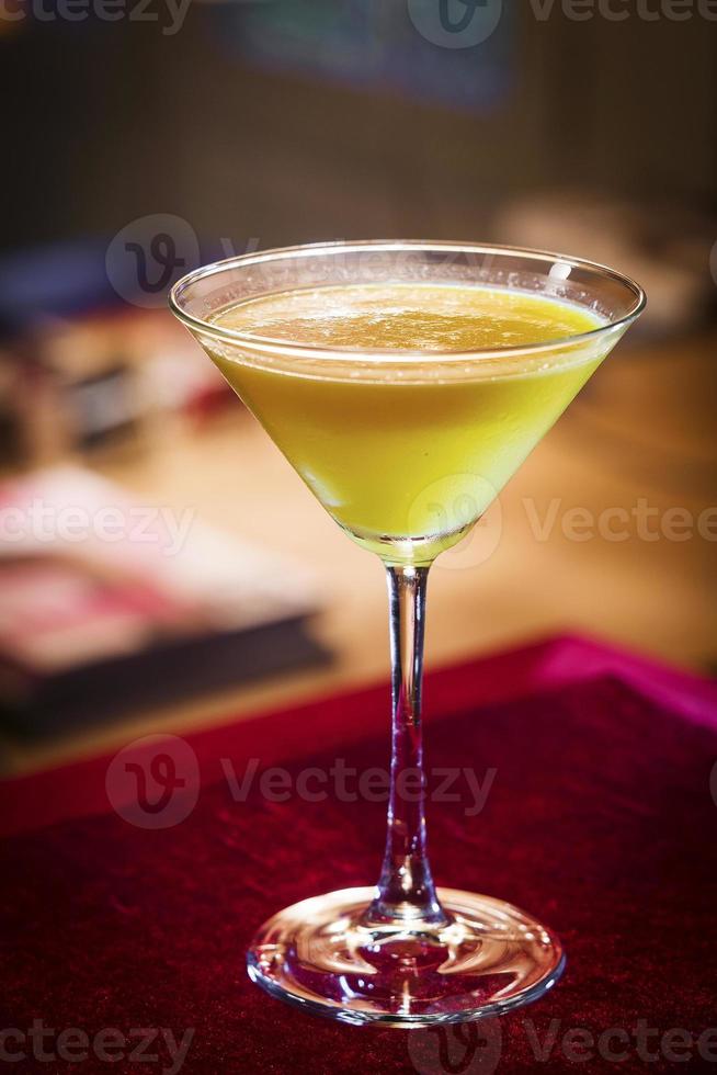 creme caramel martini cocktail in trendy bar photo