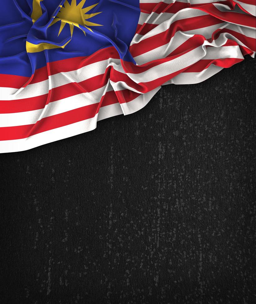 Malaysia Flag Vintage on a Grunge Black Chalkboard With Space For Text photo