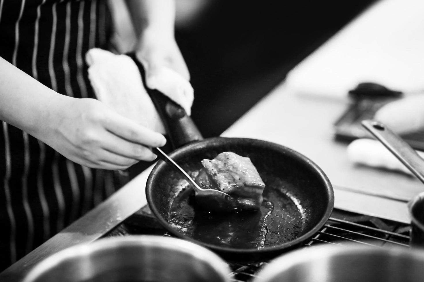 chef cooking in a kitchen, chef at work, Black and White photo