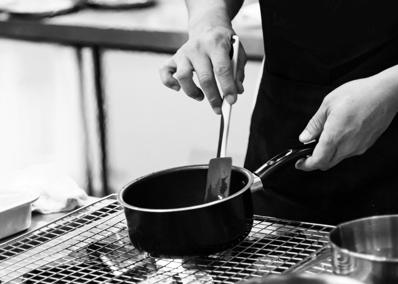 chef cooking in a kitchen, chef at work, Black and White photo