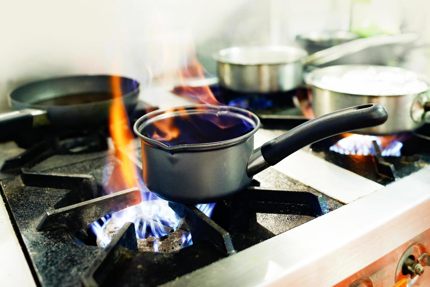 chef cooking, Chef preparing food, Chef decorating dish in the kitchen photo