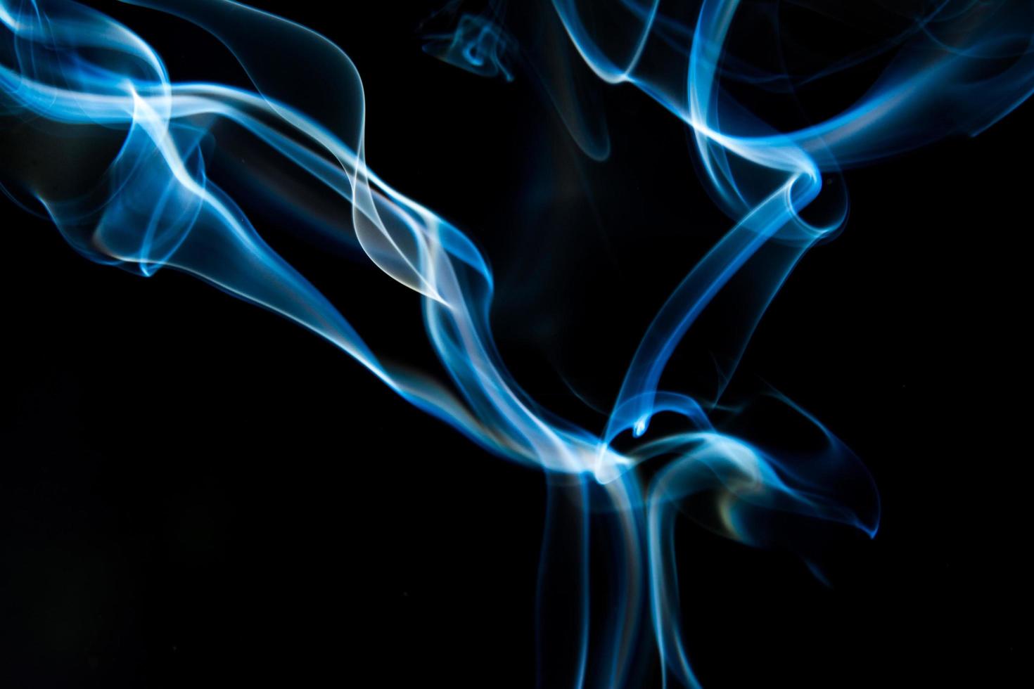 Blue smoke on black background, smoke abstract photo