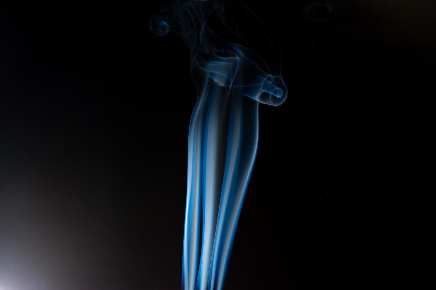 Blue smoke on black background, smoke abstract photo