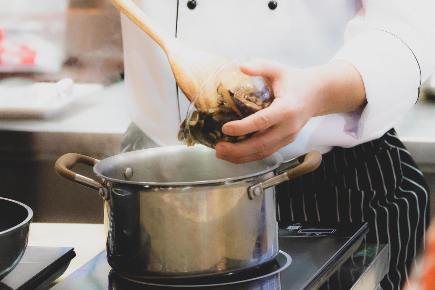 Chef preparing food, meal, in the kitchen, chef cooking photo