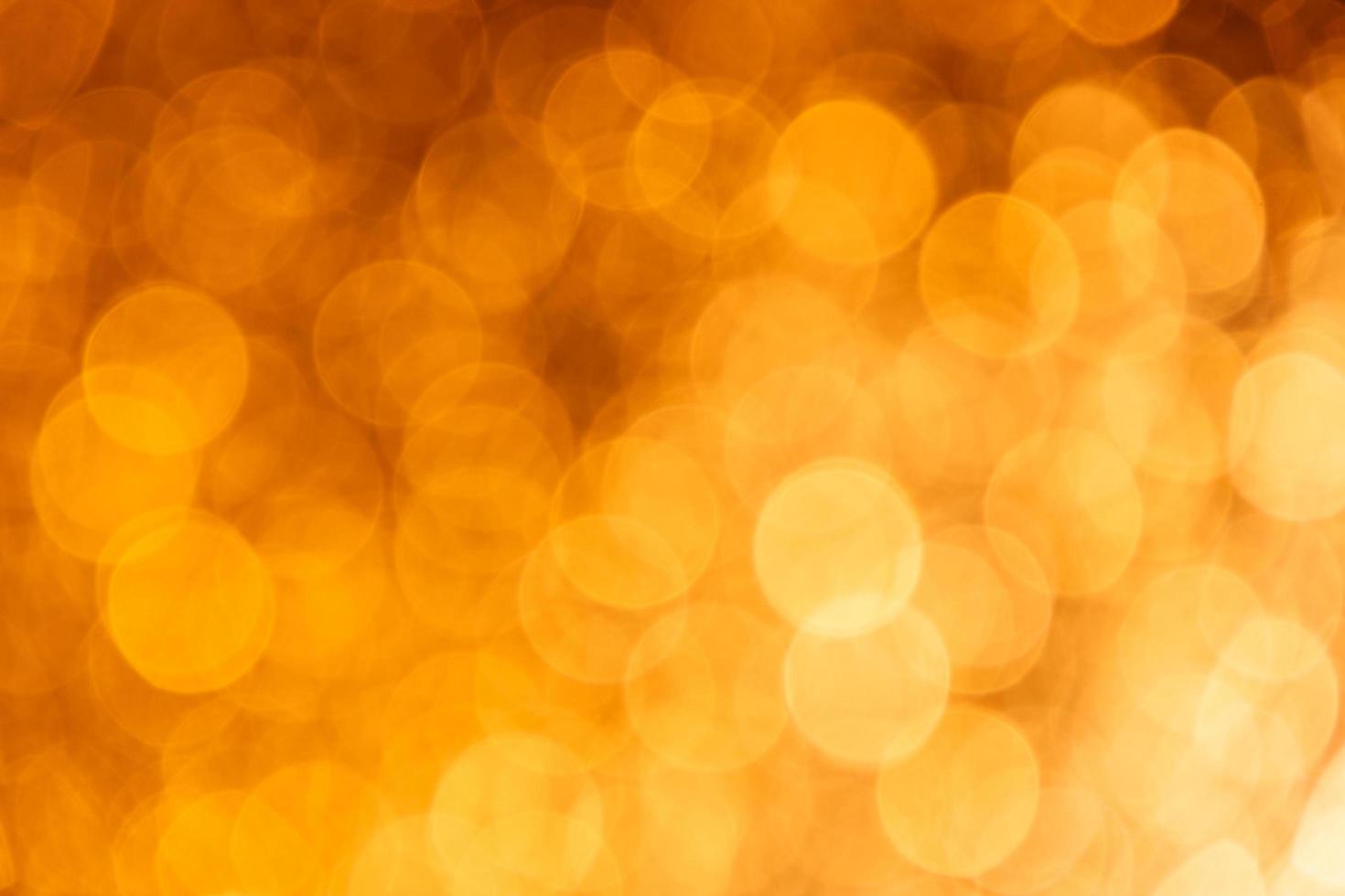 Golden yellow background with abstract blurred highlights photo