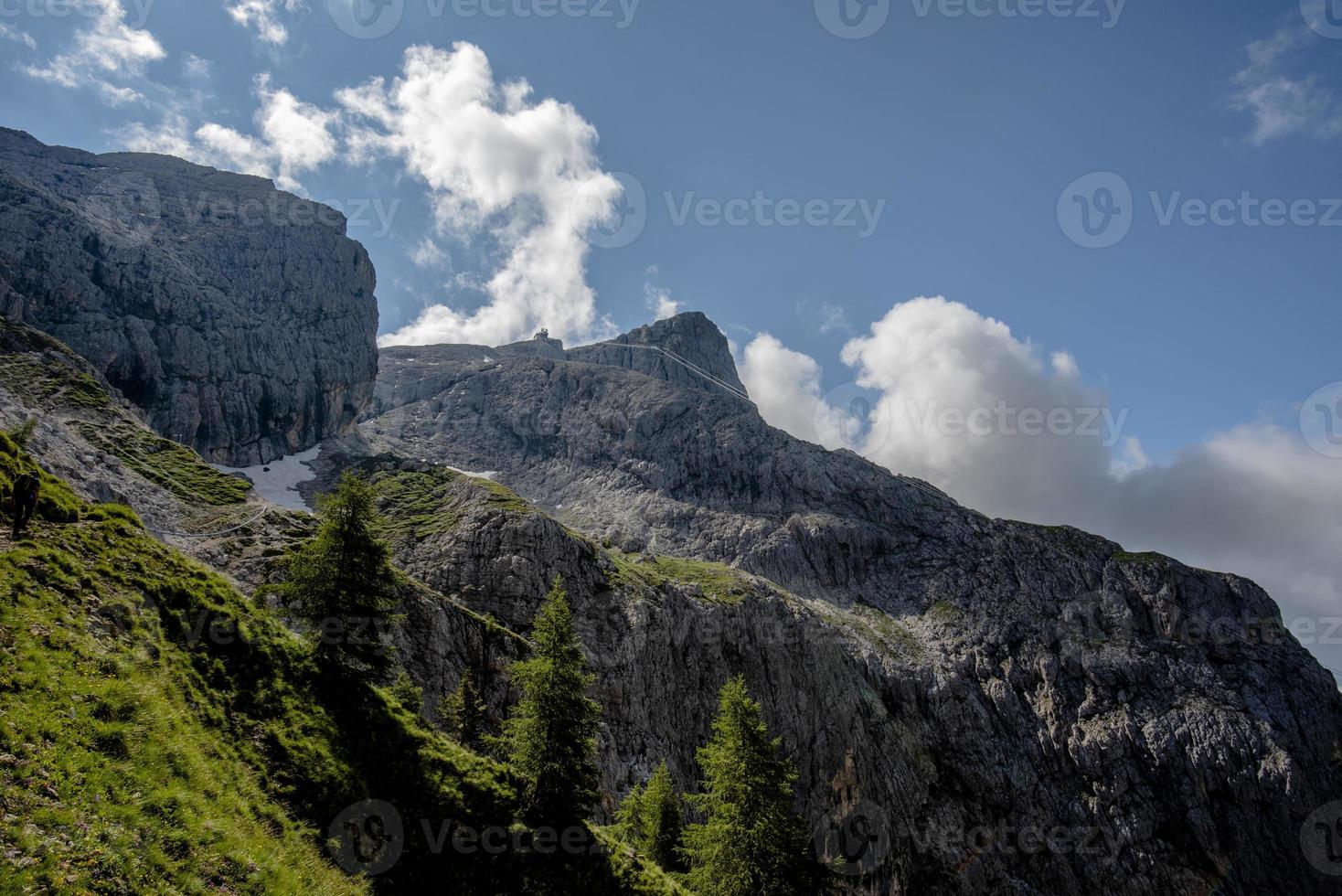 Clouds surround the beautiful Dolomites around San Martino di Castrozza and Passo Rolle, Trento, Italy photo