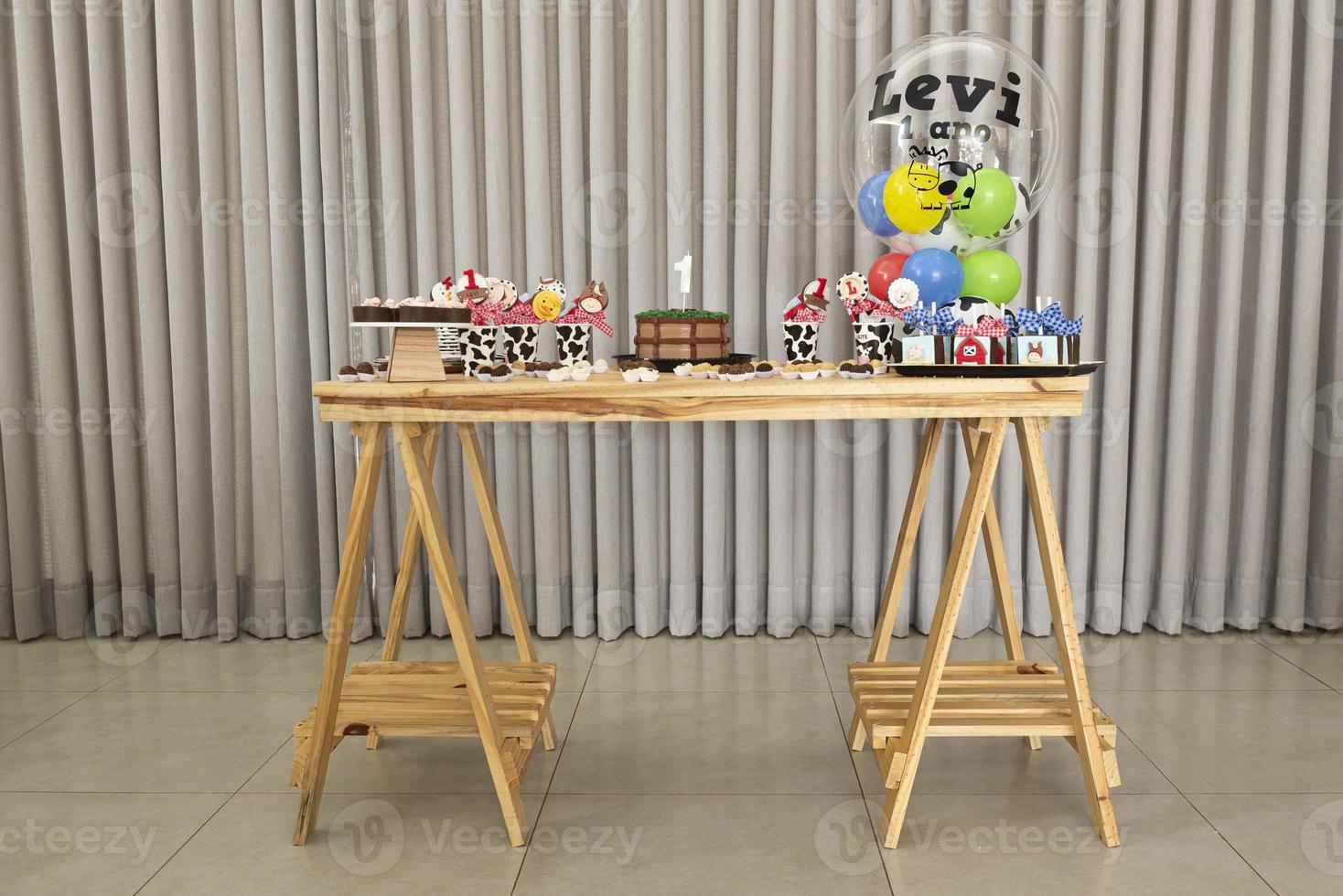 Rustic children's birthday cake table with farm, countryside theme photo