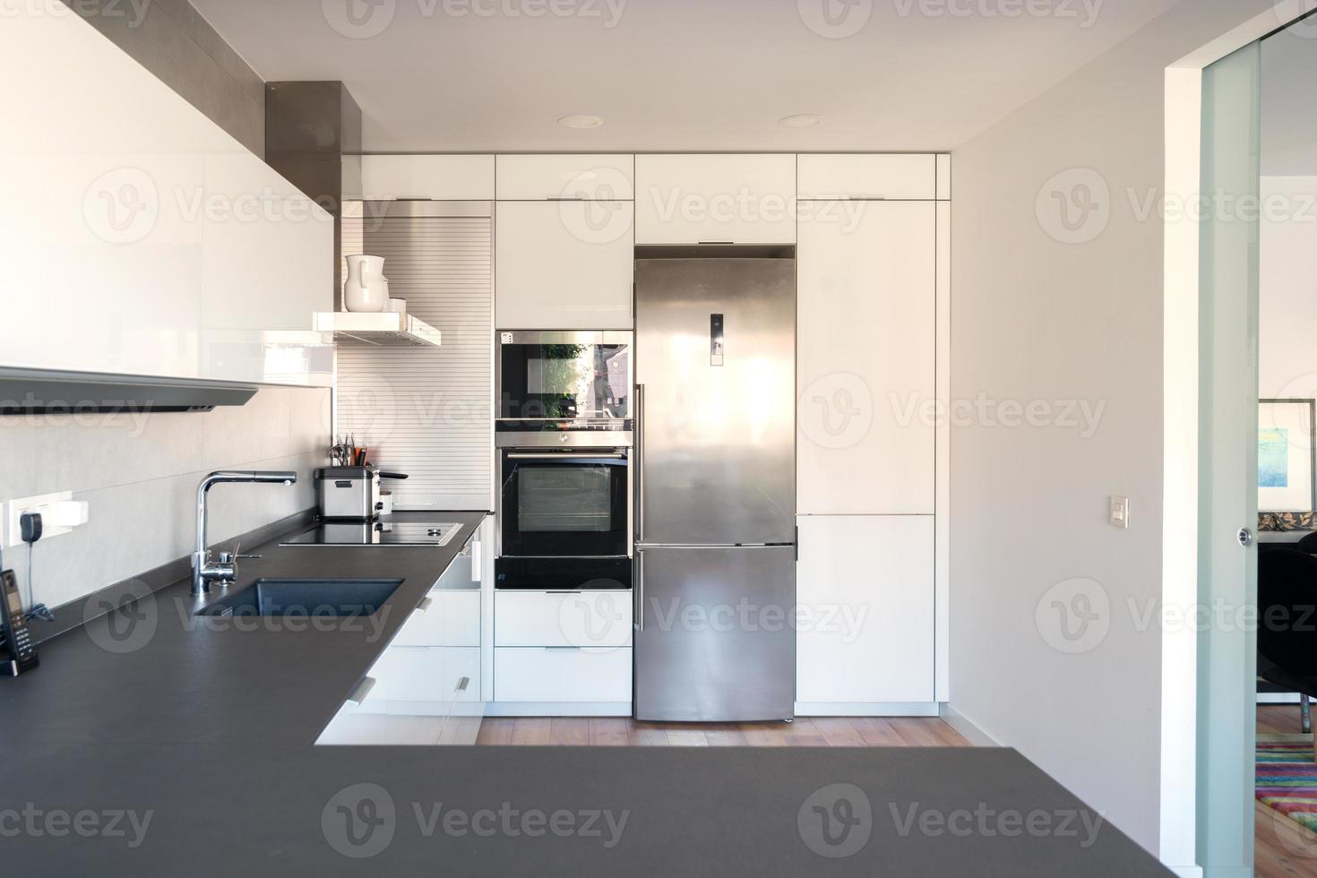 Beautiful modern kitchen in white and black. Madrid photo