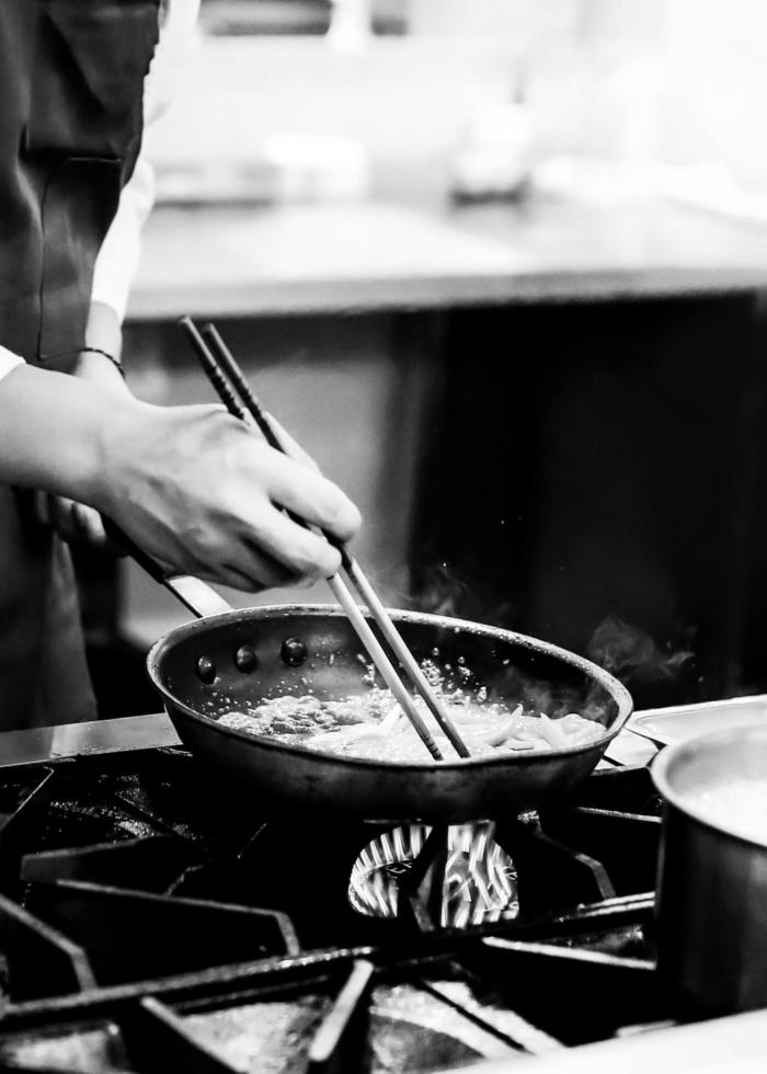 Chef cooking in a kitchen, Black and White photo