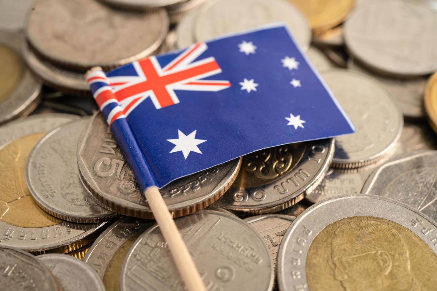 New Zealand flag on coins background photo