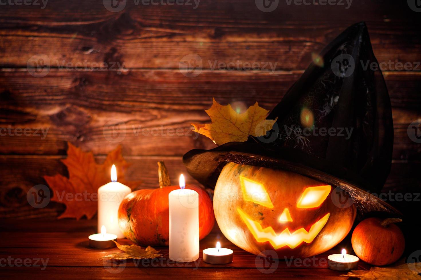 Happy Halloween. Pumpkin in witch hat photo