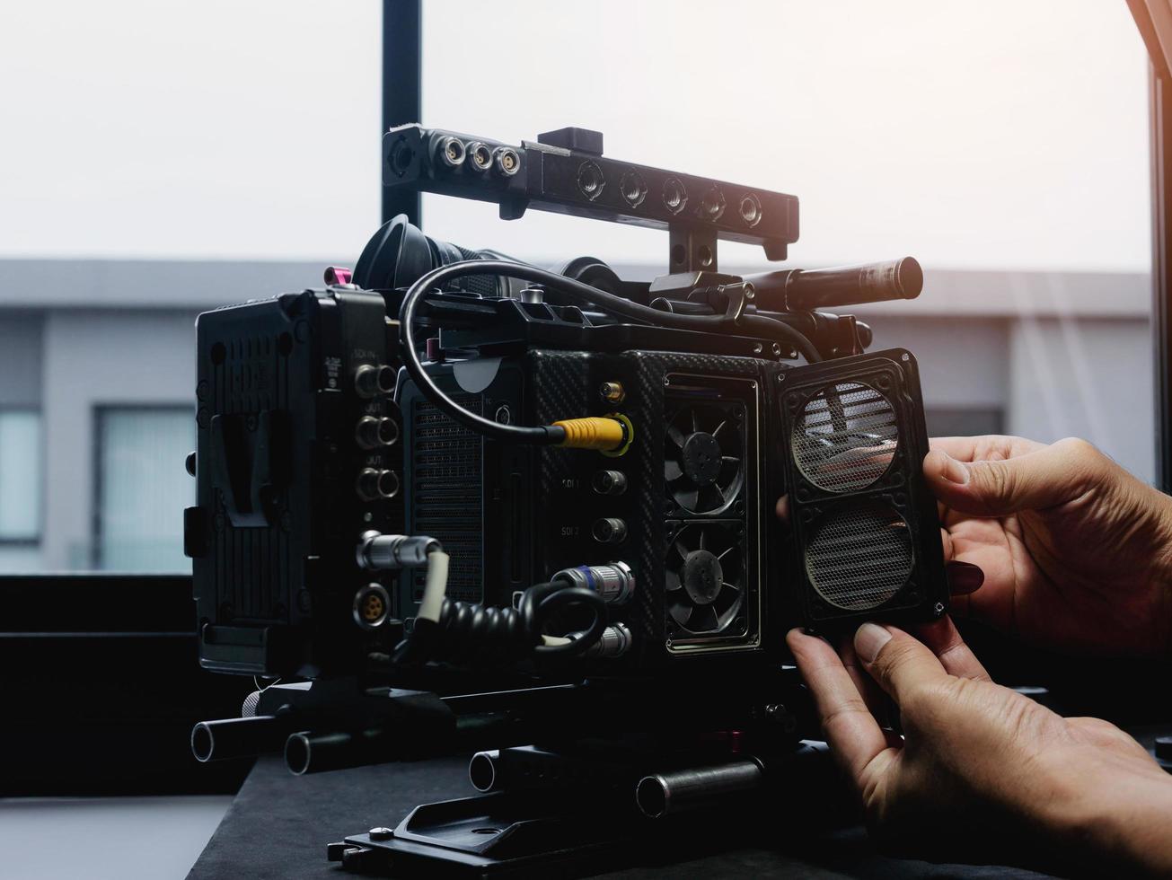 Open the cooling fan cover of the movie camera to clean and repair. photo