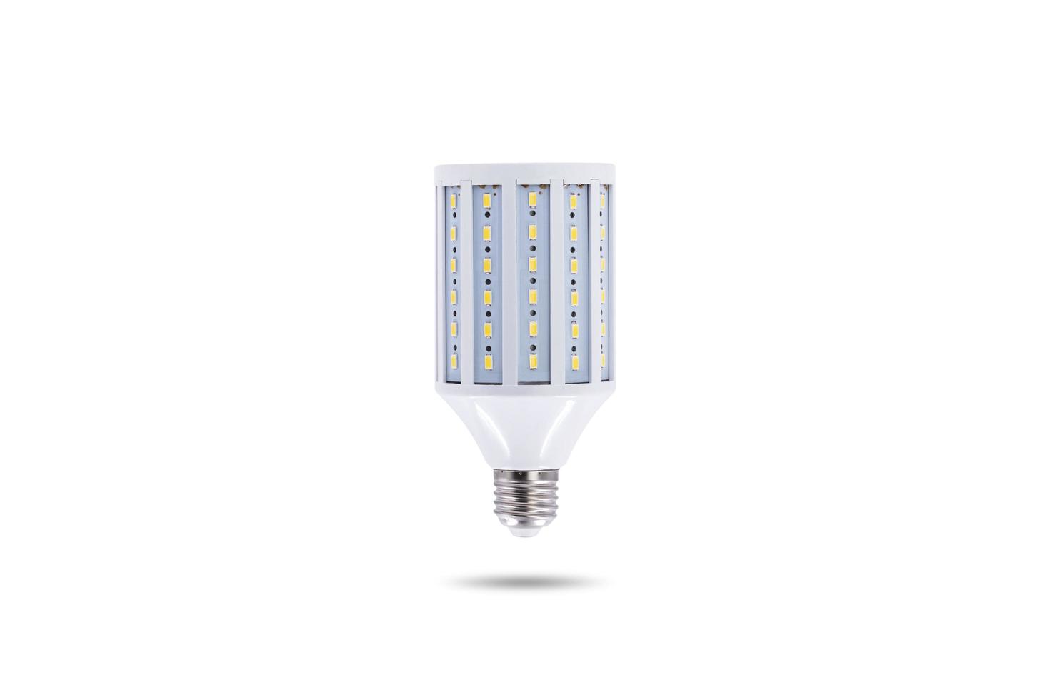 LED energy saving lamp screw cap E27 230v on white background. photo