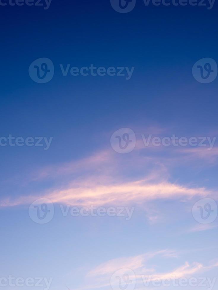 Fluffy clouds in the blue sky with morning light from the sunrise photo