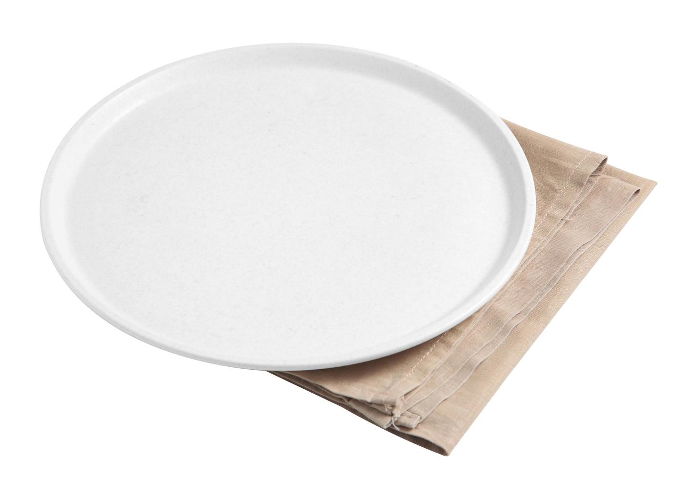 Empty ceramic tray and napkin isolated on white background photo