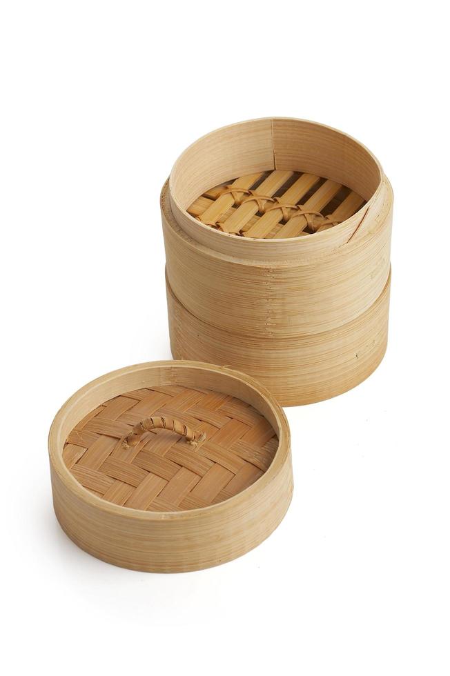 Wooden dim sum plate on white background photo