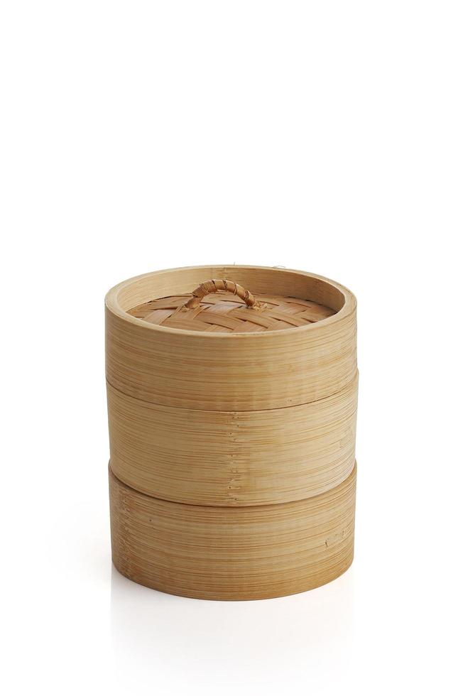 Wooden dim sum plate on white background photo