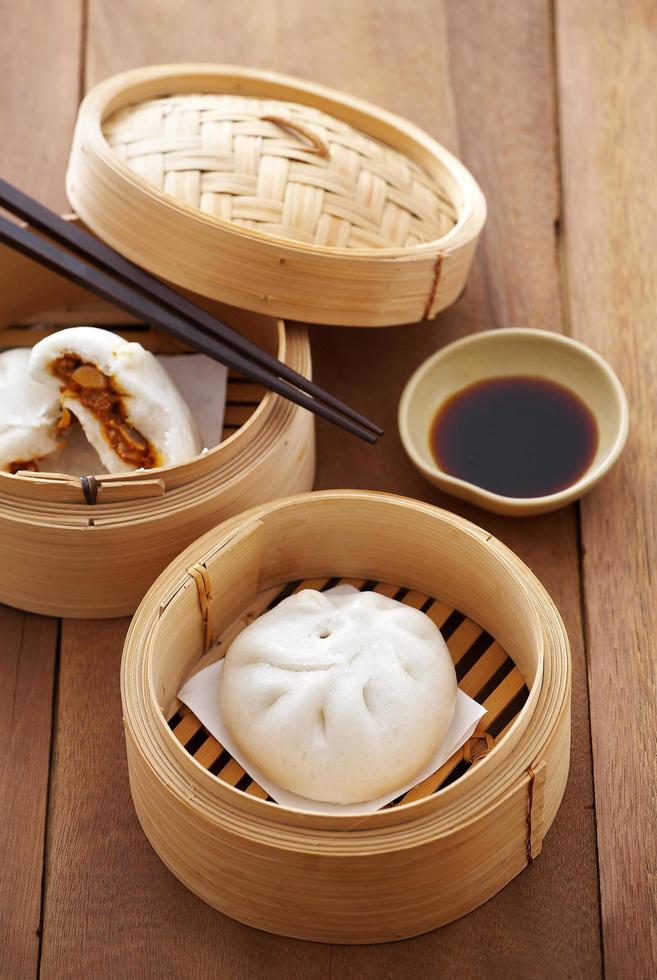 Chinese pork bun in bamboo basket photo