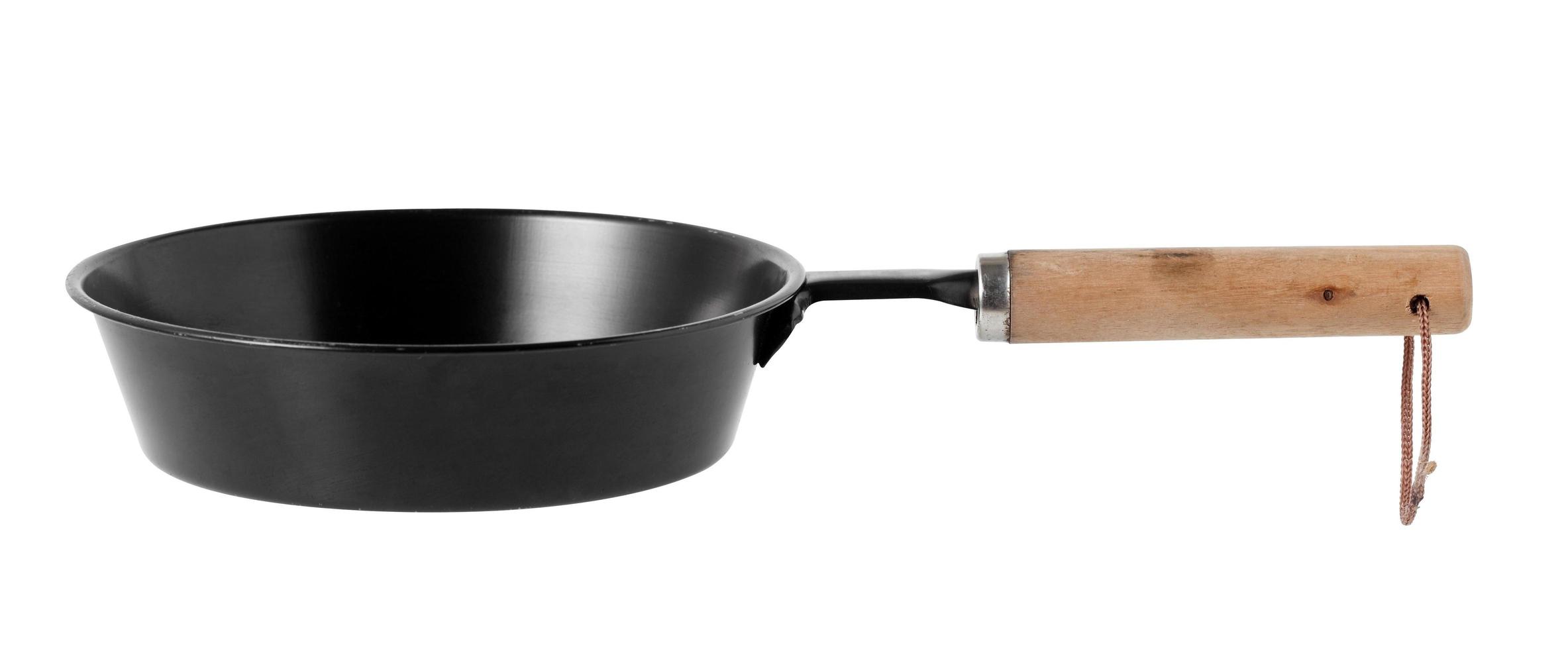 Iron black pan on white background photo