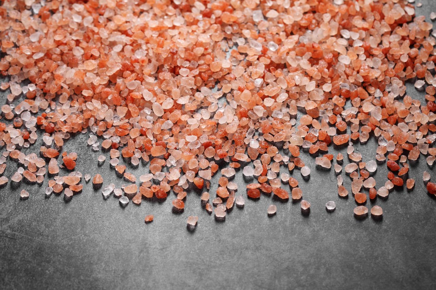 Close up a pile of Himalayan pink salt in natural light photo