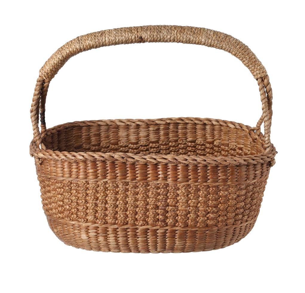 Vintage Thai wicker basket on white background photo